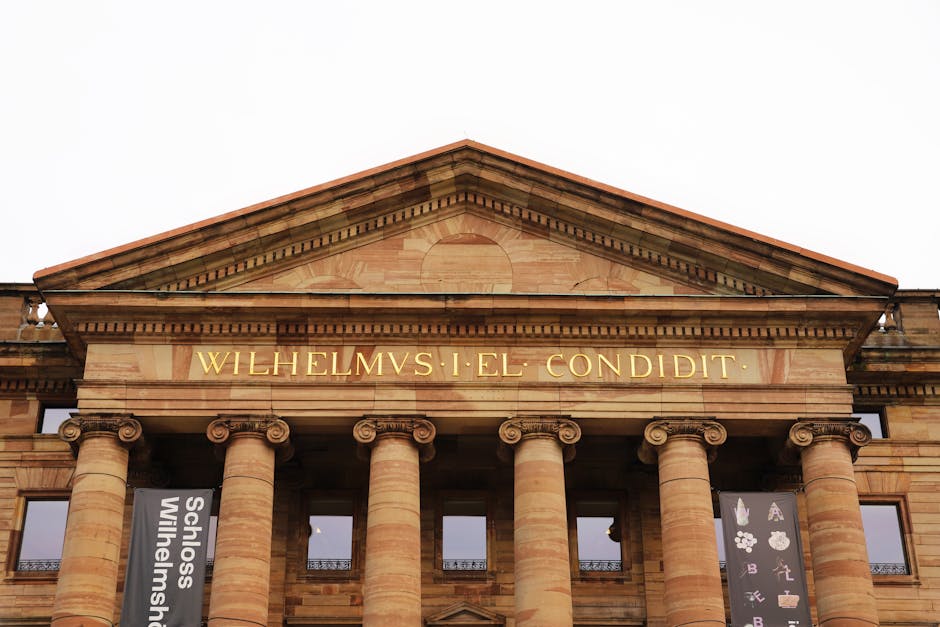 Elegant facade of Schloss Wilhelmshöhe, Kassel, showcasing neoclassical architecture.
